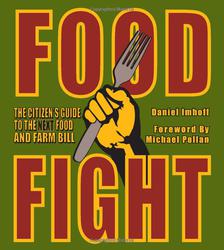 Green background, yellow-rimmed red letters, and a fist wrapped combatively around a fork