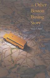 A toy school bus on top of a map of metro Boston